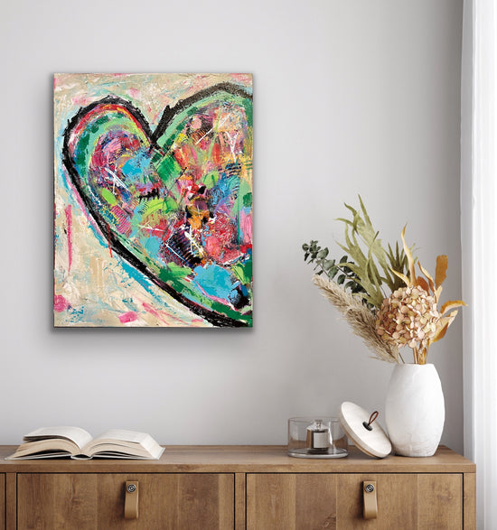 Textured abstract heart painting in vibrant colors like teal, pink, green, and red on an 18x24 inch canvas by Cindy Trestman. 2